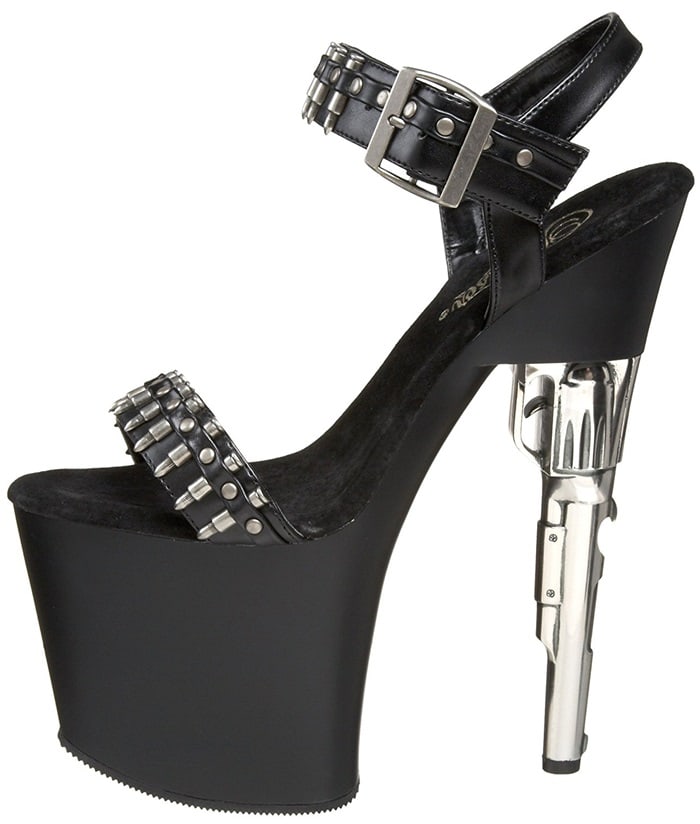 Combining a sculptural pistol-inspired heel with bullet-trimmed straps, the Bondgirl-712 exemplifies the exaggerated design language that defined the collection