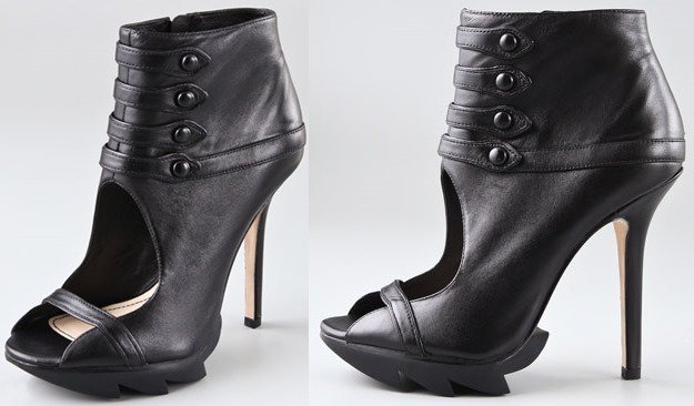 Kristen Stewart stepped out in Camilla Skovgaard’s edgy black open-toe button booties featuring cutout details, buttoned straps, and the designer’s signature jagged sole