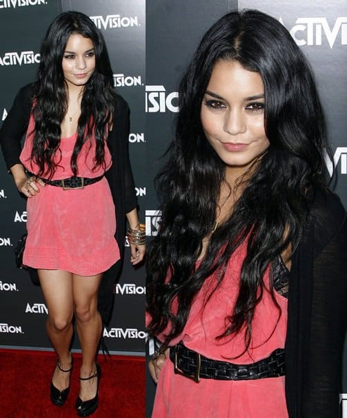 vanessa hudgens activision e3 preview jun 14 Vanessa Hudgens wears a tastefully short coral dress cinched with a black belt, layered with a sheer cardigan, and paired with sleek black platform heels at the Activision E3 2010 Preview Event held at Staples Center in Los Angeles on June 14, 2010