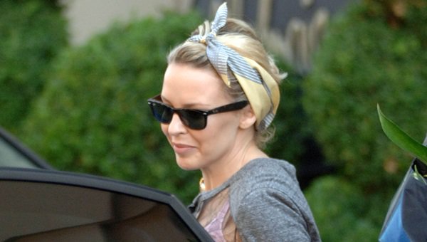 Kylie Minogue wears a chic headscarf