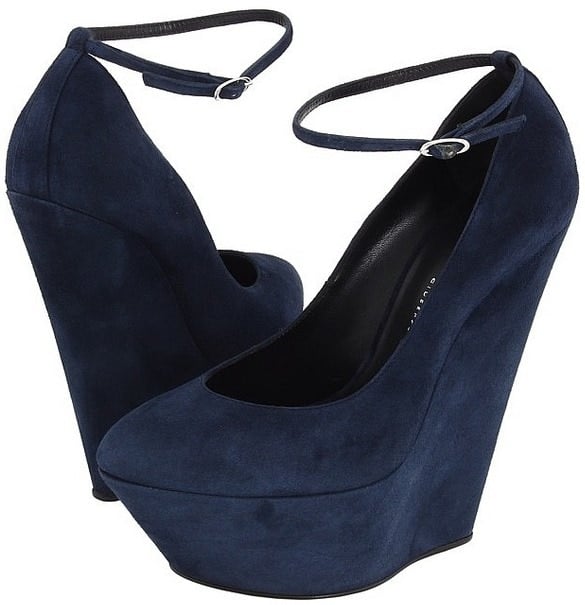 These navy blue suede Giuseppe Zanotti platform wedges offer bold height with an elegant ankle strap