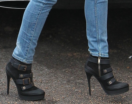 Cheryl Cole arrives at 'The X Factor' studios London Cheryl Cole pairs her casual jeans with elegant black boots, adding a touch of glamour to her ensemble