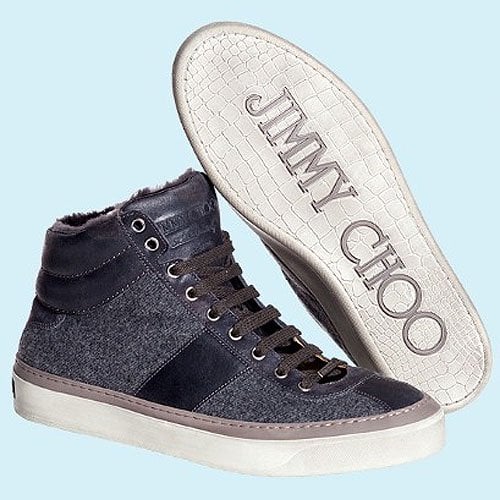 Jimmy Choo men's high-top trainers A stylish Jimmy Choo high-top sneaker featuring a luxe mix of suede and wool, finished with a signature crocodile-embossed sole for a refined urban edge