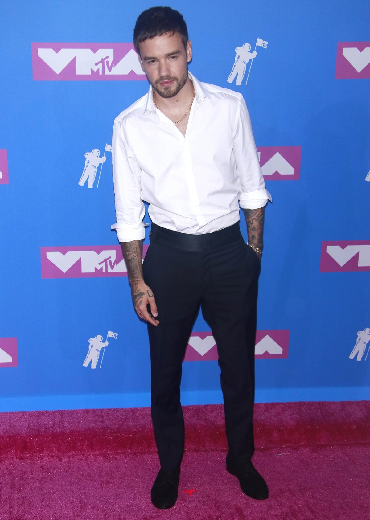 Liam Payne kept it effortlessly sleek at the 2018 MTV VMAs, pairing a crisp Lanvin shirt and trousers with Jimmy Choo Saxe lace-up shoes, finished with Tiffany’s jewelry for a refined touch