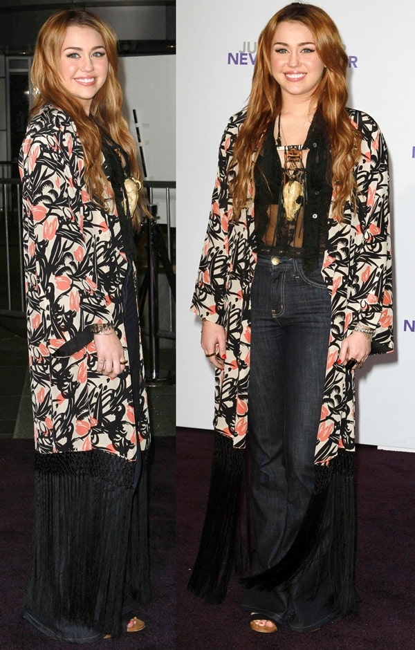 Miley Cyrus embraces boho-chic at the Never Say Never premiere, pairing a fringed Winter Kate Barbary kimono jacket with high-rise flare jeans, a sheer black top, and open-toe platform heels for a retro-glam look
