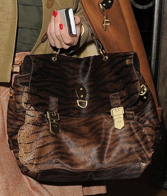 Olivia Palermo London Fashion Week A/W 2011 - Mulberry show, held at Claridges Hotel Olivia's Mulberry animal print Tillie tote