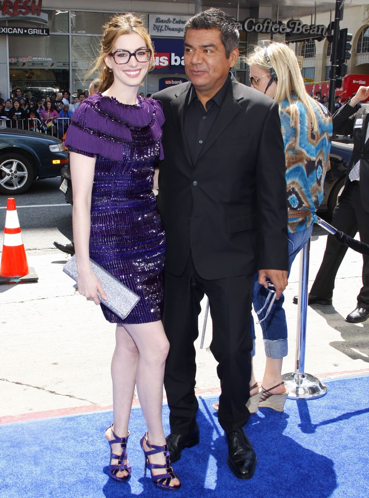 Anne Hathaway and George Lopez arrive for the premiere of Twentieth Century Fox Blue Sky Studios' "RIO"