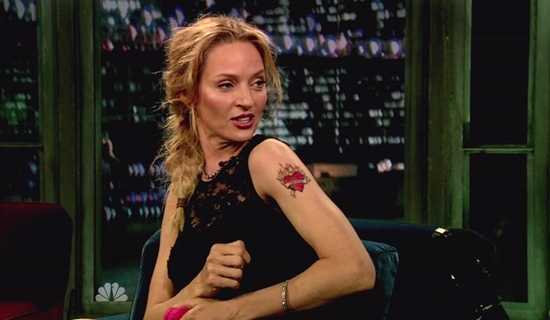 ng uma thurman 090411 Uma Thurman in a black Dolce Gabbana dress