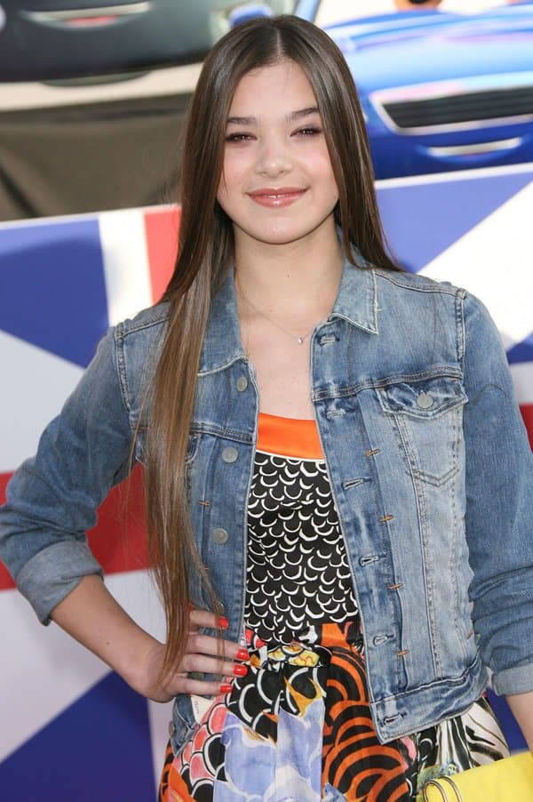 Hailee Steinfeld exudes youthful charm in a vibrant multi-print dress and a classic denim jacket as she attends the Cars 2 world premiere at the El Capitan Theatre in Hollywood, California, on June 18, 2011