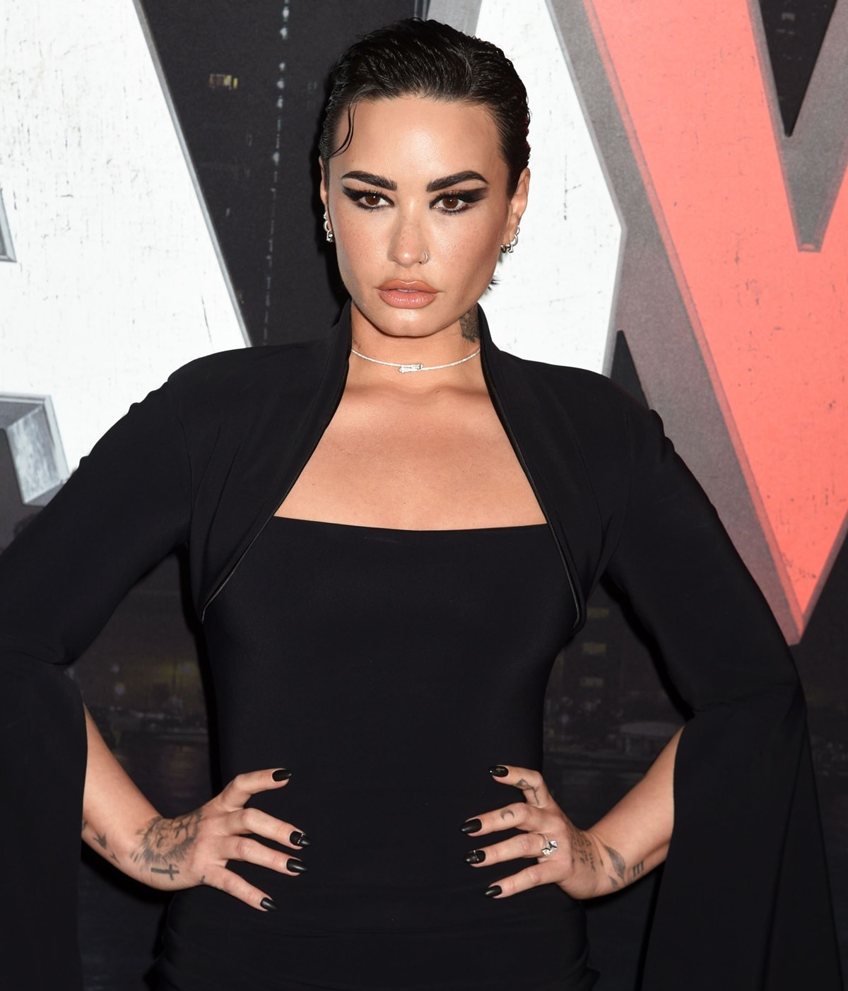 Demi Lovato channels gothic elegance in a chic black ensemble, perfectly setting the tone for a high-drama red carpet look