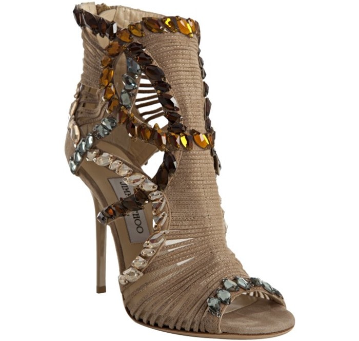 Jimmy Choo’s ‘Elba’ jeweled suede sandal booties sparkle with multicolored crystals and a strappy cut-out design, adding red-carpet glamour to any look