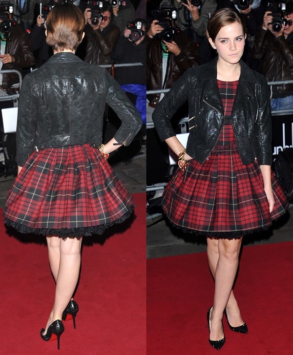 Emma Watson made a striking appearance at the GQ Men Of The Year Awards in a tartan plaid minidress by McQ, the diffusion line of Alexander McQueen, paired with a glossy black moto jacket