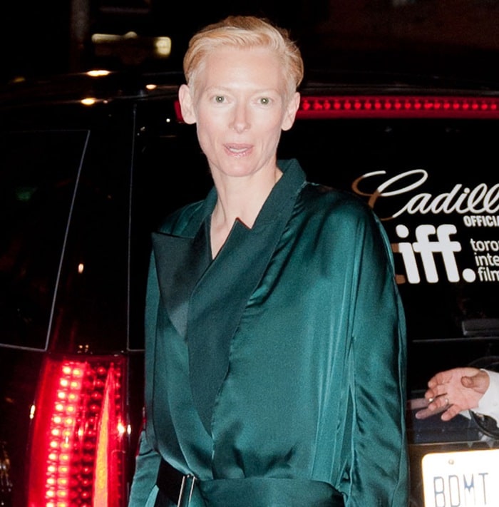 ilda Swinton wears a trench/robe jacket at the 2011 Toronto Film Festival premiere of "We Need To Talk About Kevin"