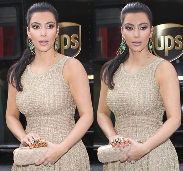 Kim Kardashian arriving at a Manhattan Hotel with Knuckle Clutch Kim Kardashian in a dress by Azzedine Alaïa arrives at her hotel in Manhattan