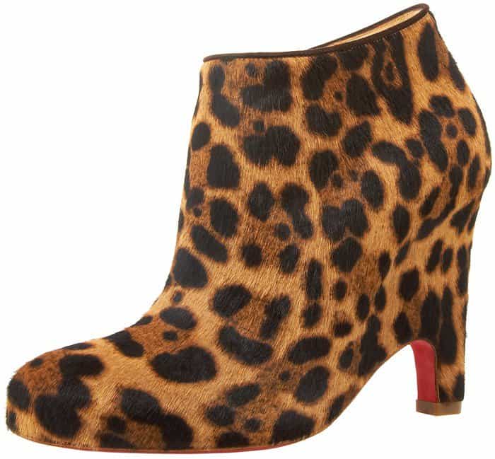 Christian Louboutin “Morphing” leopard-print booties, crafted from dyed calf hair with an architectural, sculpted heel that adds edge and structure to otherwise delicate looks