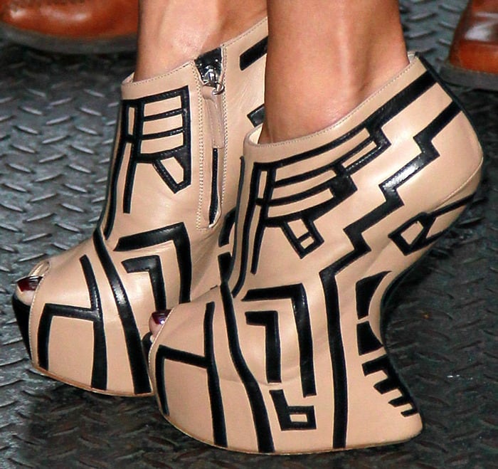 Close-up of Nicole’s beige-and-black geometric Giuseppe Zanotti heel-less booties, a standout from the designer’s Spring/Summer 2012 collection