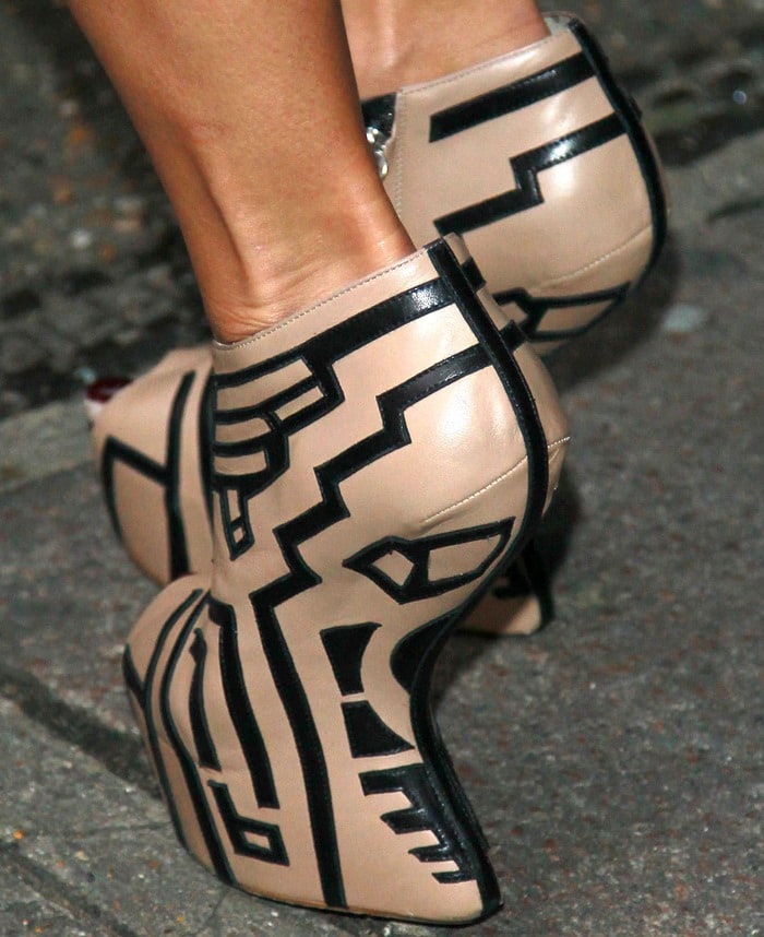 Rear view of the sculptural heel-less design highlighting Zanotti’s signature curved silhouette