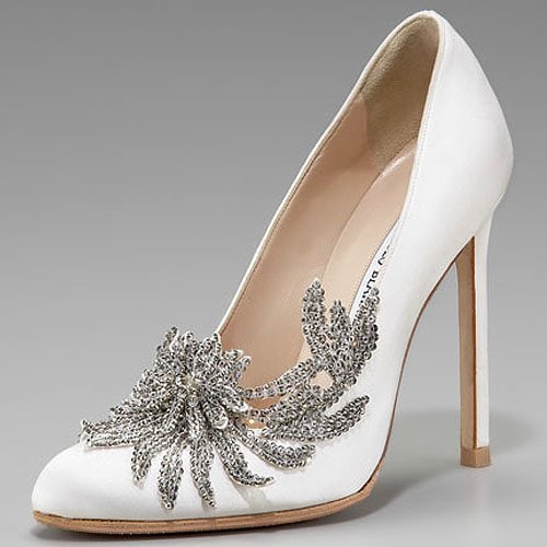 Manolo Blahnik Swan embellished satin pumps Bella Swan's wedding shoes are these Manolo Blahnik satin pumps aptly named "Swan"