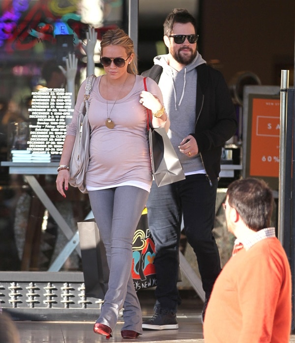 Hilary Duff in Christian Louboutin Vicky Ankle Booties Pregnant Hilary Duff and husband Mike Comrie leave the Beverly Hills location of Barney's New York