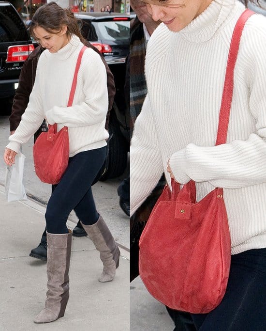Katie Holmes arrives at the her hotel in Manhattan On December 17, 2011, Katie Holmes was seen leaving her NYC hotel wearing Oliver Peoples Shean keyhole Wayfarer sunglasses, a Clare Vivier messenger bag, and Nine West Daley wedge boots