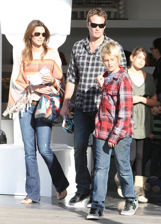 Cindy Crawford and husband Rande Gerber out and about in Cross Creek with their children Presley and Kaia Malibu Cindy Crawford wears Paige Lou Lou jeans while out with her family