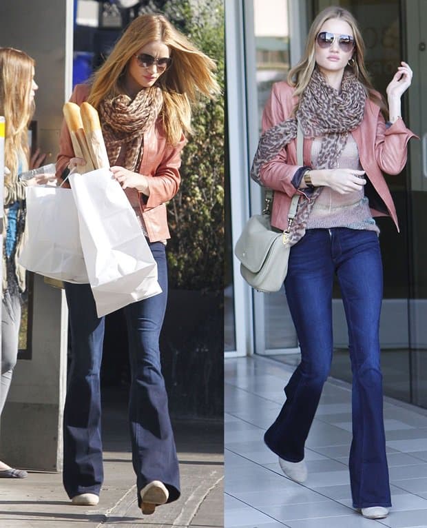 Rosie Huntington-Whiteley wears a cozy Isabel Marant mohair blend sweater with a sleek IRO Ashville washed leather biker jacket and a pair of classic Rag Bone Classic Newbury booties
