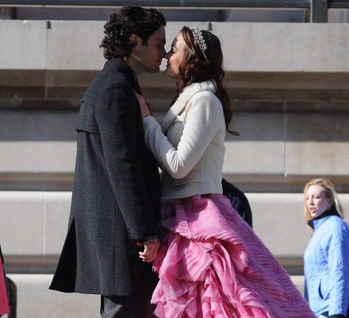 Leighton Meester stuns in a pink Oscar de la Renta ball gown while Penn Badgley keeps it classic in a black tuxedo as they film a romantic Gossip Girl scene