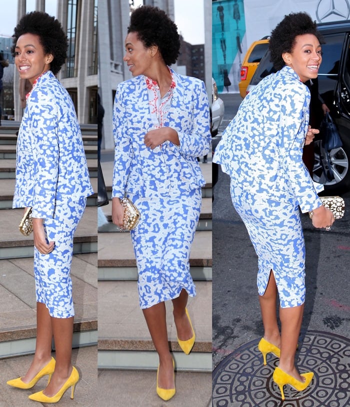 Solange Knowles stuns in a bold blue-and-white Diane von Furstenberg printed suit, perfectly complemented by vibrant yellow pointy-toe pumps and a gold statement clutch
