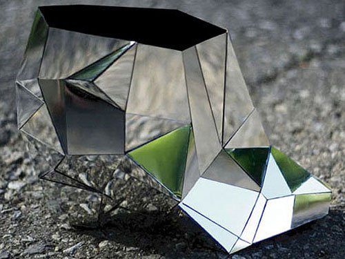 Andreia Chaves invisible shoes These invisible shoes are wedge ankle booties that use mirrors to reflect their surroundings, creating the illusion of invisibility