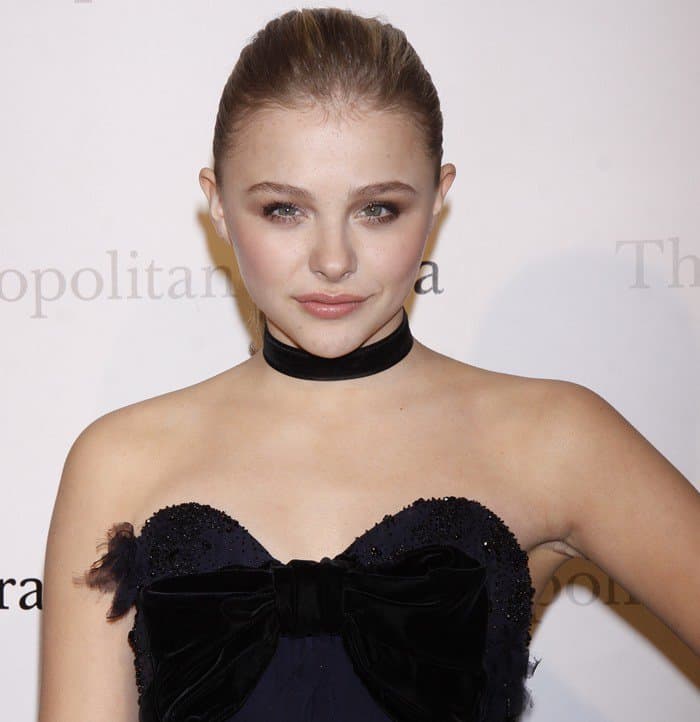 Chloë Grace Moretz in a blue YSL tiered gown at the Metropolitan Opera's premiere of Jules Massenet's 'Manon'