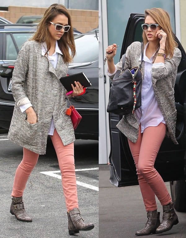 Jessica Alba styled her blush-pink Henry Belle “Ideal” skinny jeans with a textured Joe’s Jeans “Erica” long jacket and weathered leather ankle boots while out in West Hollywood on March 23, 2012, finishing the look with white retro sunglasses and a Loewe Bow Continental clutch