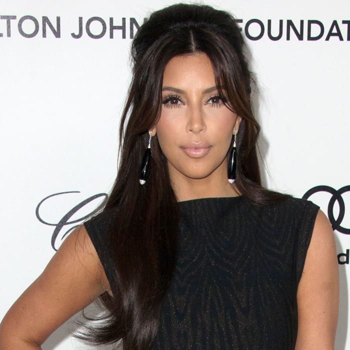 Kim Kardashian stuns in an elegant Alaïa gown, a stylish choice for the Elton John AIDS Foundation Oscar Viewing Party