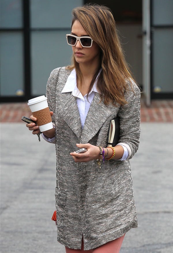 Jessica Alba wears Joe’s Jeans Erica long jacket and white-framed retro sunglasses