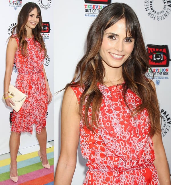 Jordana Brewster effortlessly elongates her legs in blush-tone pointy-toe pumps paired with a vibrant red and white Carolina Herrera bubble-print dress at the Paley Center’s “Television: Out of the Box” opening