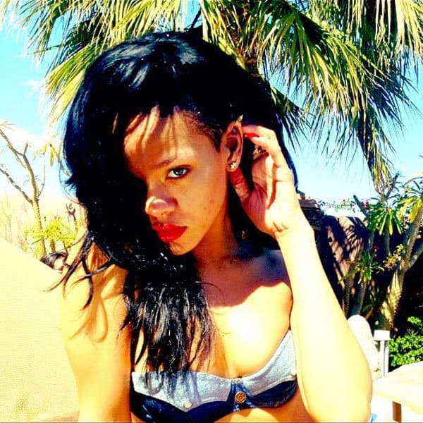 Rihanna in a denim bikini Captured in a denim bikini, Rihanna flaunts her stunning beach-ready physique