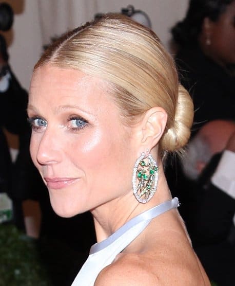 Gwyneth Paltrow Schiaparelli and Prada 'Impossible Conversations' Costume Institute Gala at The Metropolitan Museum of Art Gwyneth Paltrow wears Anna Hu Haute Joaillerie hooped earrings at the "Schiaparelli And Prada: Impossible Conversations" Costume Institute Gala at the Metropolitan Museum of Art