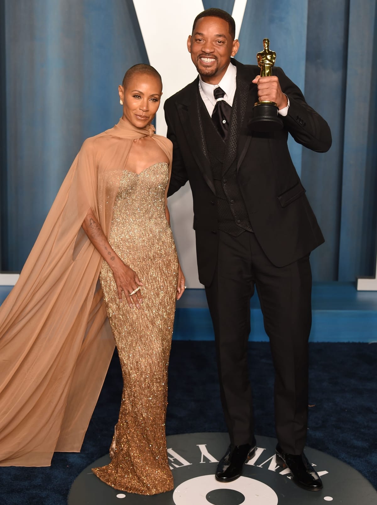 Jada Pinkett Smith in a strapless Dolce Gabbana dress covered with Swarovski crystals and Will Smith in a Dolce Gabbana mohair wool tuxedo