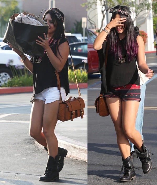 Channel Vanessa Hudgens’ signature boho-chic style by pairing black combat boots with high-waisted shorts, a flowy tank, and layered accessories for an effortless off-duty look