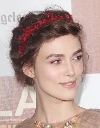 Keira Knightley at the Premiere Keira Knightley charms with Victorian-inspired tiny red florettes at the 'Seeking a Friend for the End of the World' premiere