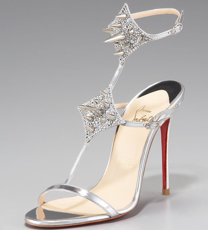 Crystal-studded panels and mirror-finish leather give the Christian Louboutin “Lady Max Spike” sandals an almost armor-like effect