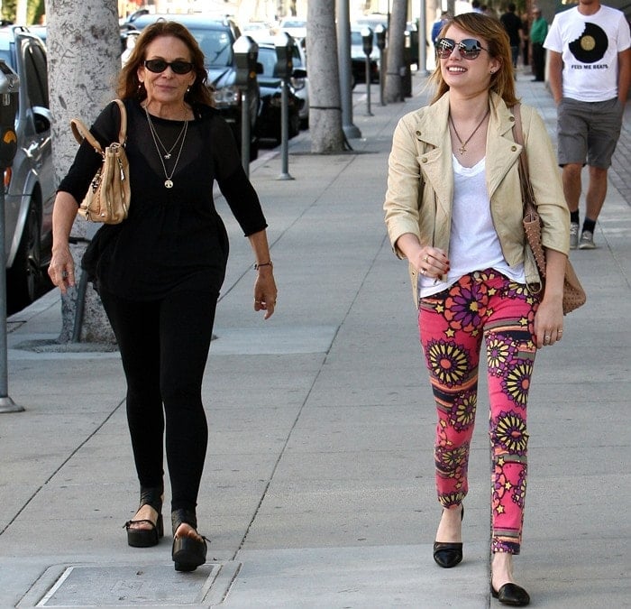 Emma Roberts steps out in psychedelic floral pants and Jenni Kayne d’Orsay flats while strolling through Los Angeles with her mom, Kelly Cunningham, on July 6, 2012
