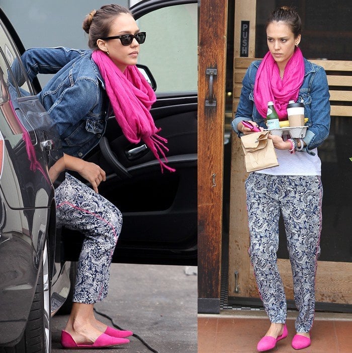 Jessica Alba steps out in patterned pants, a denim jacket, and bright pink flats paired with a matching scarf during a casual outing