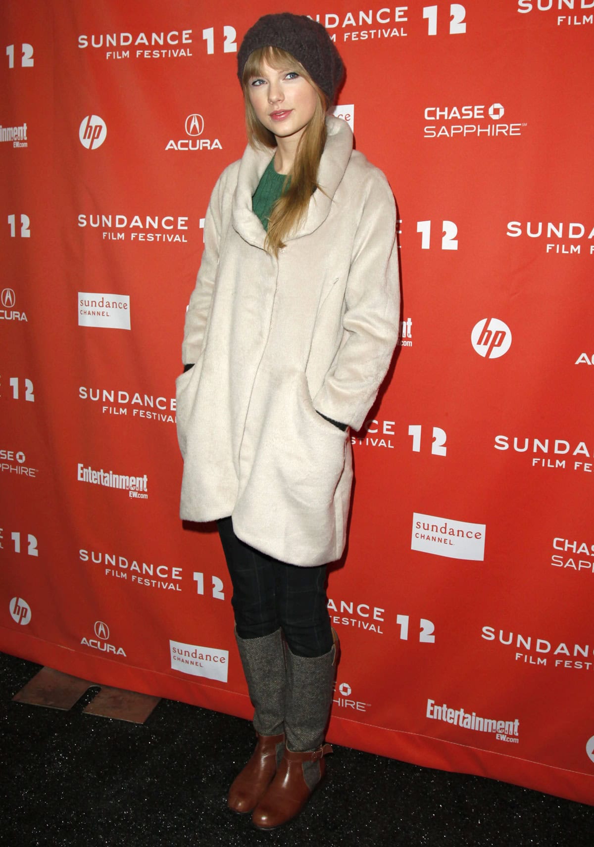 Taylor Swift bundled up in a cozy Kymerah Chrysalis coat, herringbone Schuler Sons boots, and a slouchy Urban Outfitters beanie at the Sundance Film Festival on January 20, 2012