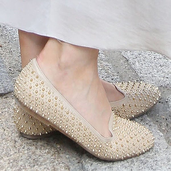Laura Whitmore shows off her feet in embellished flats