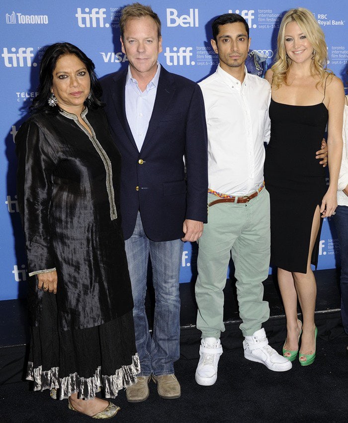 Mira Nair, Kiefer Sutherland, Riz Ahmed, and Kate Hudson pose together on the black carpet at the 2012 Toronto International Film Festival