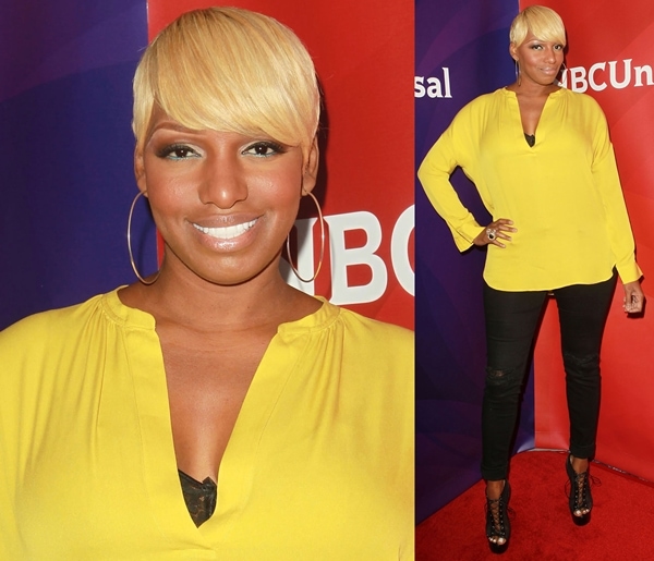 NeNe Leakes stuns in a vibrant yellow top and sleek black pants at the NBC Universal Press Tour at Beverly Hilton Hotel in Beverly Hills on July 24, 2012