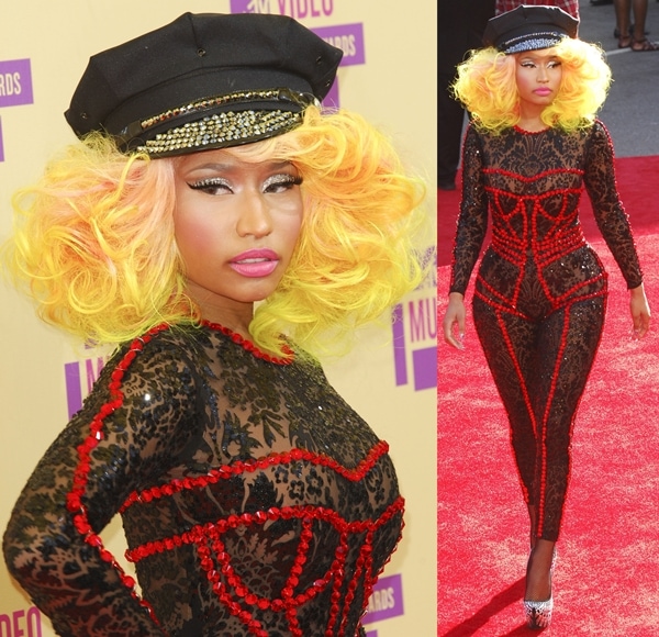 Nicki Minaj commands the MTV Video Music Awards red carpet in a black lace, ruby-embellished catsuit topped with a military-inspired cap, delivering unapologetic high-drama glamour