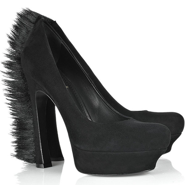 Yves Saint Laurent Palais Mohawk suede pumps The Yves Saint Laurent “Palais Mohawk” pumps combined rounded platform toes with exaggerated stiletto heels and a signature mohawk-inspired fringe trim that transformed a classic pump into a statement runway-era design