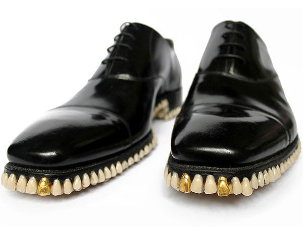 Apex Predator Shoes To add an extra touch of peculiarity, they finished the shoes with two gold teeth at the toes