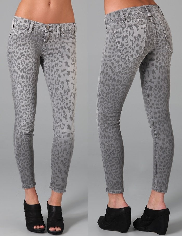 These leopard print ankle skinny jeans feature 5-pocket styling and a single-button closure.